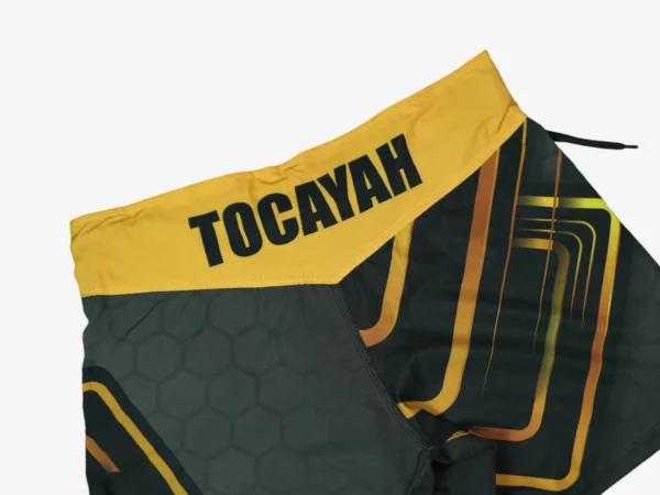 Tocayah octagon mma short gold and black 6